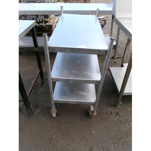 89 - A stainless three tier trolley