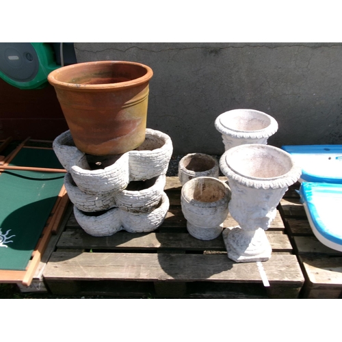 100 - Assorted reconstituted stone planters together with a terracotta planter