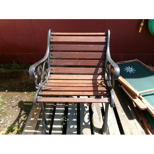 102 - A metallic and wooden garden chair