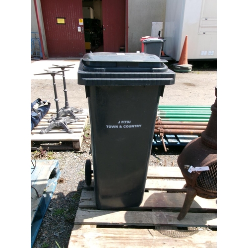 131 - A grey PVC wheelie bin