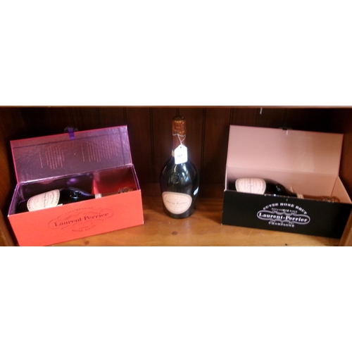 265 - Two presentation bottles of Laurent-Perrier rose brut Champagne together with one other