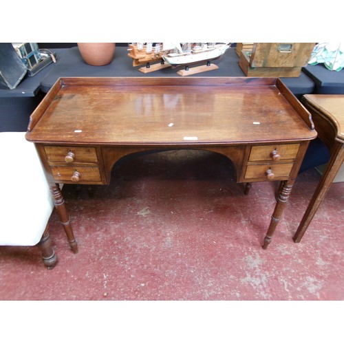 268 - A mahogany sideboard fitted two short drawers either side