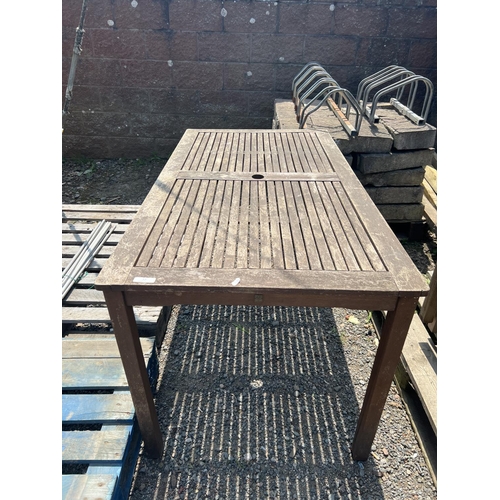 33 - A teak rectangular garden table