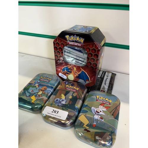 203 - A collection of Pokemon trading cards in original tins