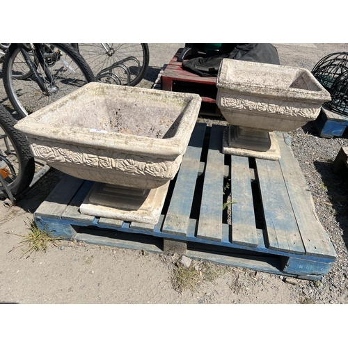 101 - A pair of reconstituted stone square tapered planters