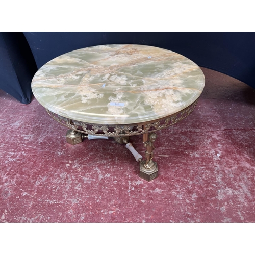 287 - A mid century onyx top gilded circular lamp table