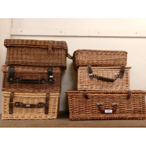 408 - Five wicker picnic hampers and a wicker basket