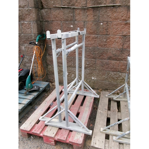 30 - A pair of adjustable galvanised building trestles