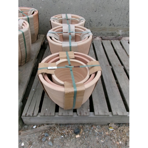 55 - Three graduated sets of three terracotta planters - new