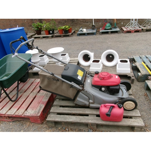 73 - A Honda HRB476C self propelled motor mower together with a fuel can