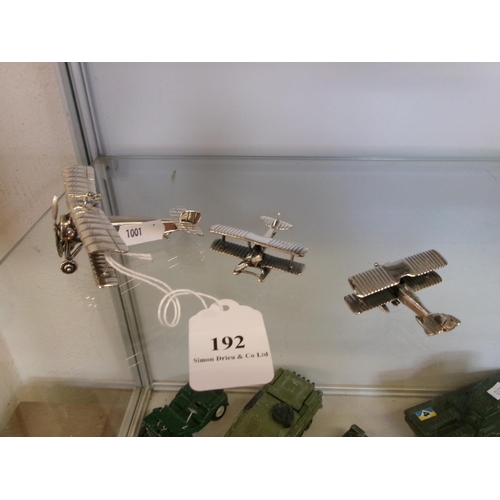 192 - Three sterling silver models of aeroplanes