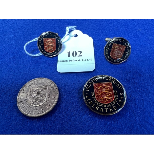 102 - A commemorative Island of Jersey Liberated 1945 1/12th shilling together with a pair of commemorativ... 