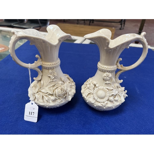 117 - A pair of Belleek jugs (first period)