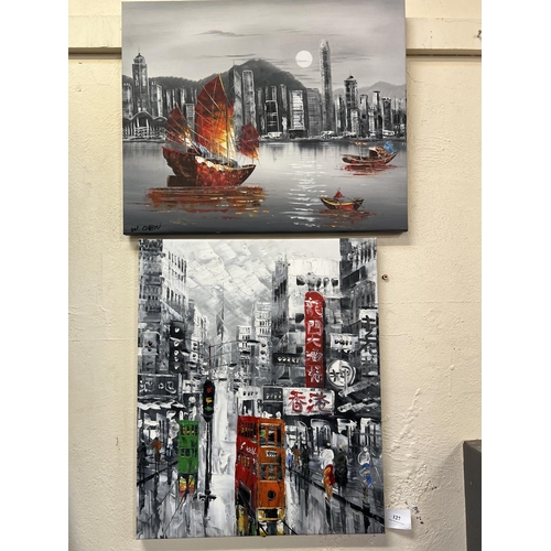 127 - Two wall canvases each depicting Hong Kong