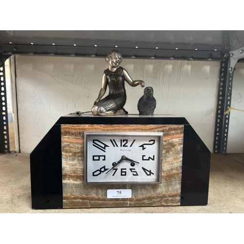 75 - A French turn of the twentieth century mantle clock with figural and bird decoration