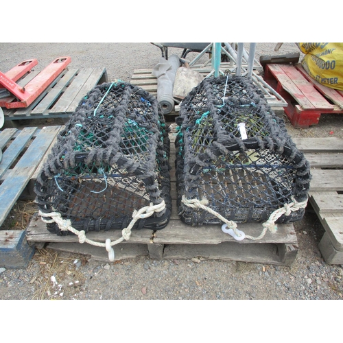 100 - Two parlour lobster pots