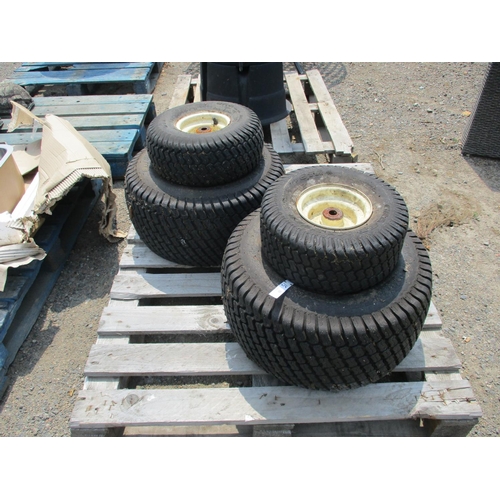 33 - A set of four garden tractor turf tyres and wheels (to fit Kubota or similar)