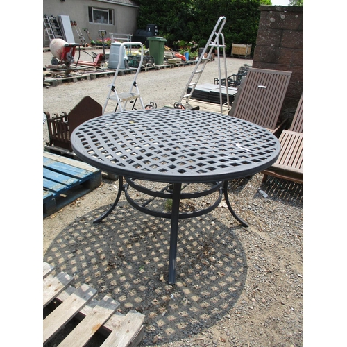 35 - A Hartman pierced aluminium circular garden table with lattice design