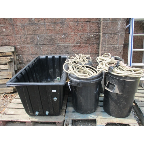 56 - A quantity of leaded pot rope together with four plastic dustbins and a PVC tank