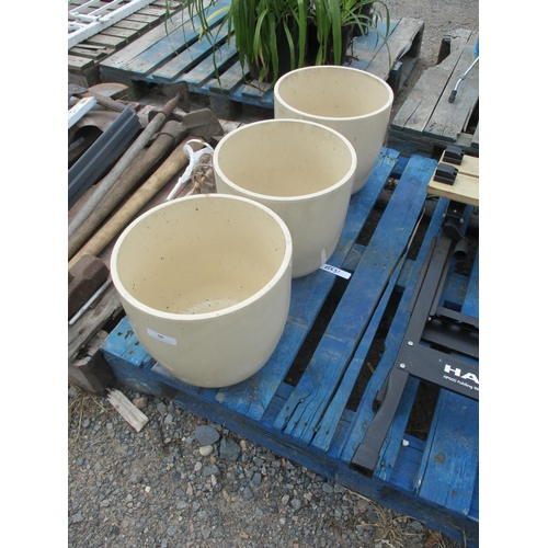 90 - A set of three ceramic planters