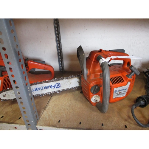 128 - A Husqvarna 338 XPT chainsaw