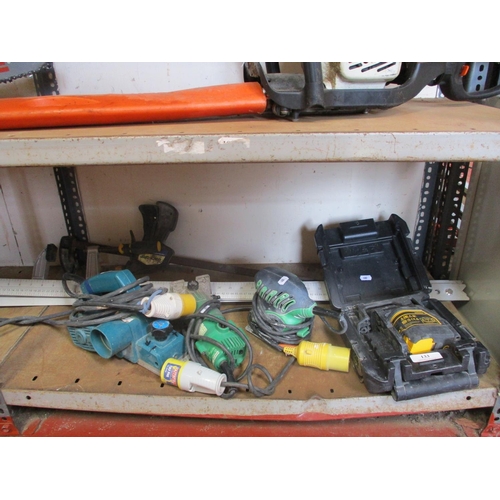 133 - Assorted 110 volt power tools, quick grip clamps, a straight edge etc.