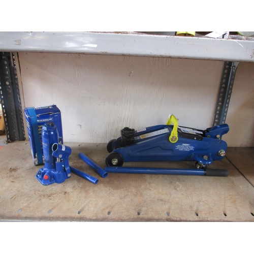 141 - A Sealey hydraulic trolley jack together with a Michelin bottle jack