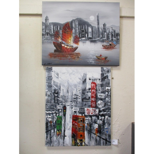 185 - Two wall canvases each depicting Hong Kong