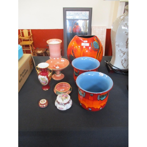 235 - A range of pottery by Poole, Jersey Pottery and other makers