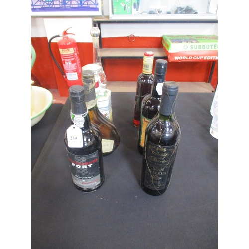 240 - An assortment of Port, wines and spirits