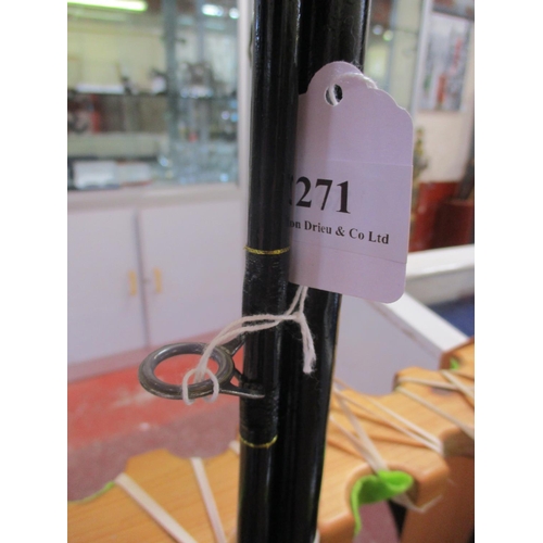 271 - A Shimano spinning rod fitted a Seatech fixed spool reel