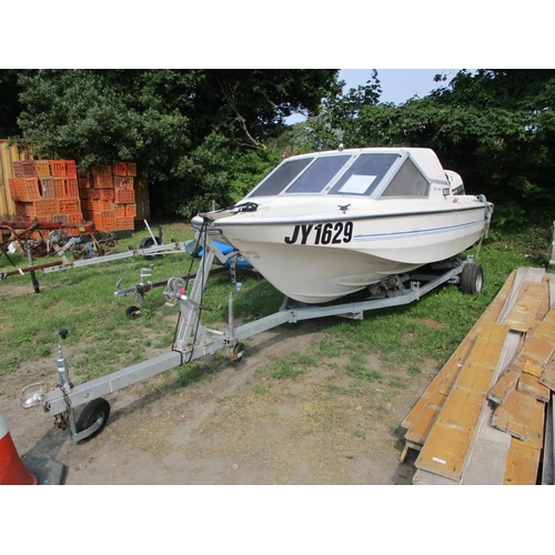 17 - A Fletcher 5.4 metre sports boat JY1629 with Johnson V4 140hp outboard engine and trailer