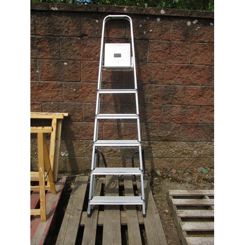 38 - An aluminium six tread step ladder