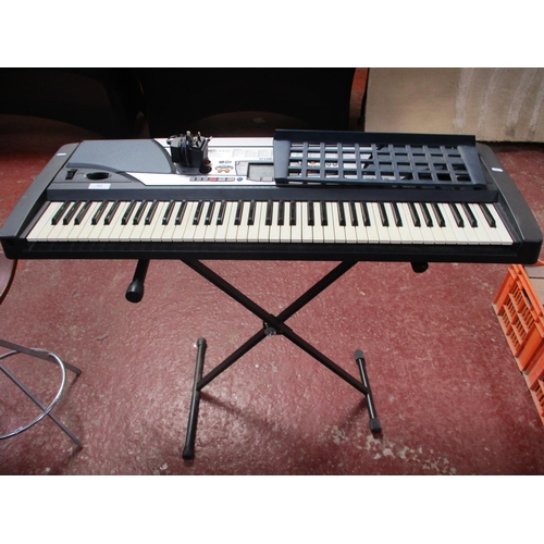 262 - A Yamaha PSR-GX 76 electronic keyboard and stand