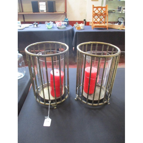 270 - A pair of metallic simulated bamboo candle holders