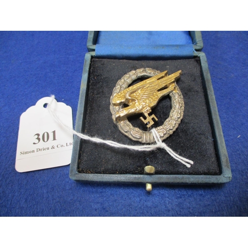 301 - A World War II German paratrooper badge with case of issue