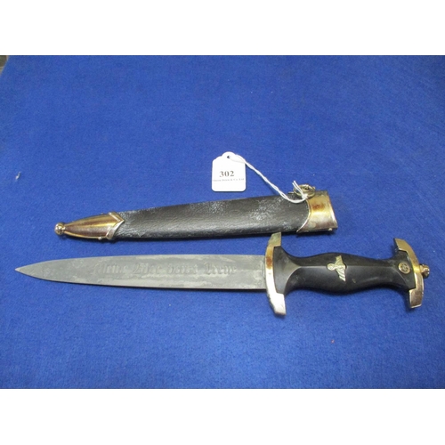 302 - A German dagger and sheath