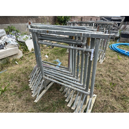 32 - Ten galvanised trestles