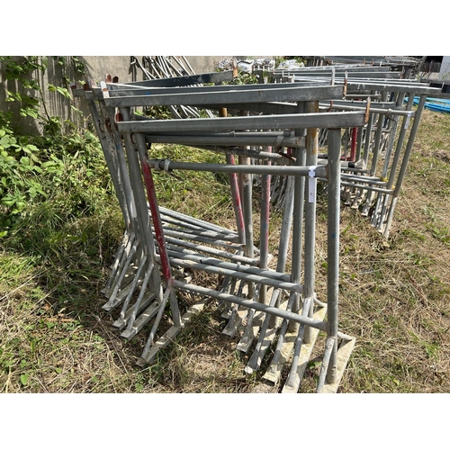 35 - Ten galvanised trestles