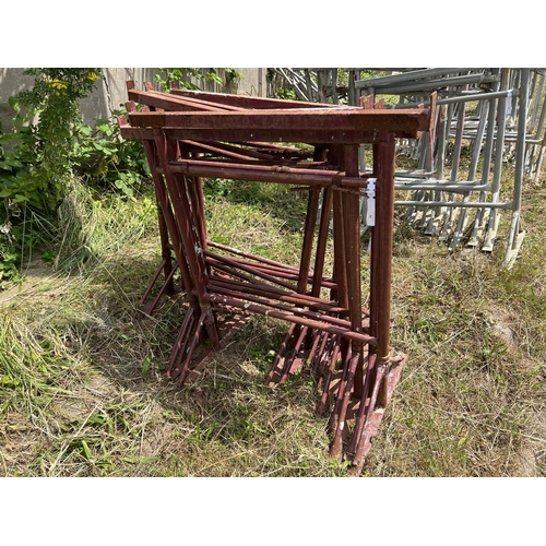 36 - Ten painted trestles