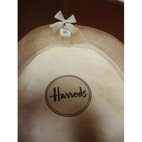 217 - A vintage boater hat by Messrs. Harrods of London with original box (size 58)