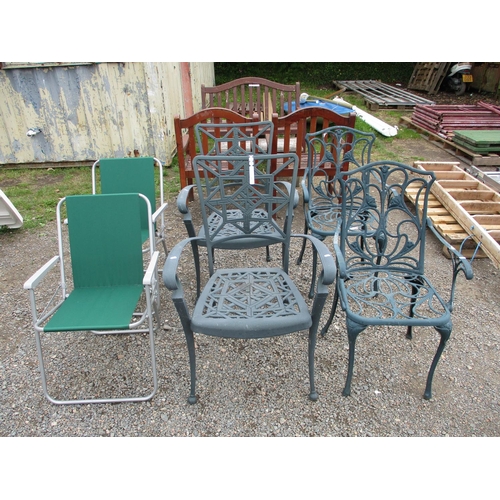 23 - Two pairs of aluminium garden chairs finished in green together with a pair of folding garden chairs