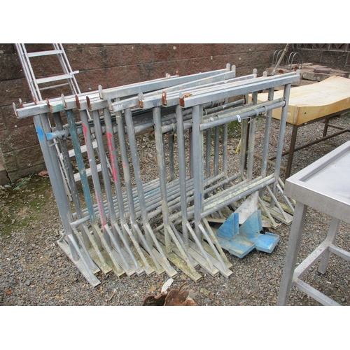 51 - Fourteen galvanised builder's trestles