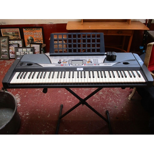 393 - A Yamaha PSR-GX76 electronic keyboard and stand