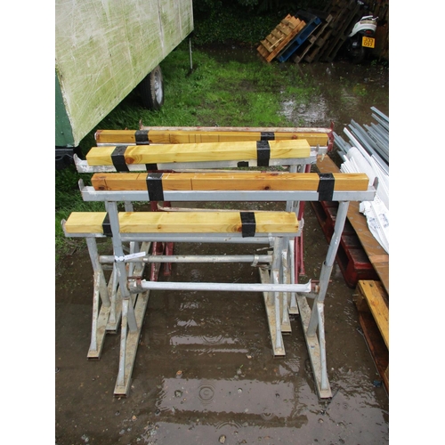 29 - Four galvanised building trestles together with two others