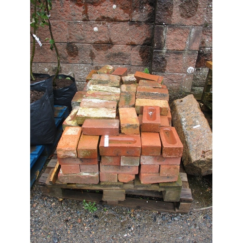 56 - A quantity of red bricks