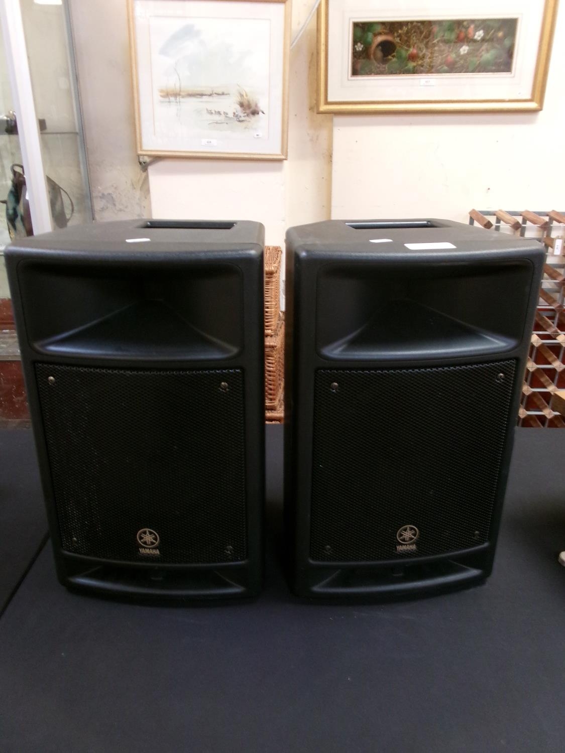 A pair of Yamaha Stagepas  portable PA system audio speakers