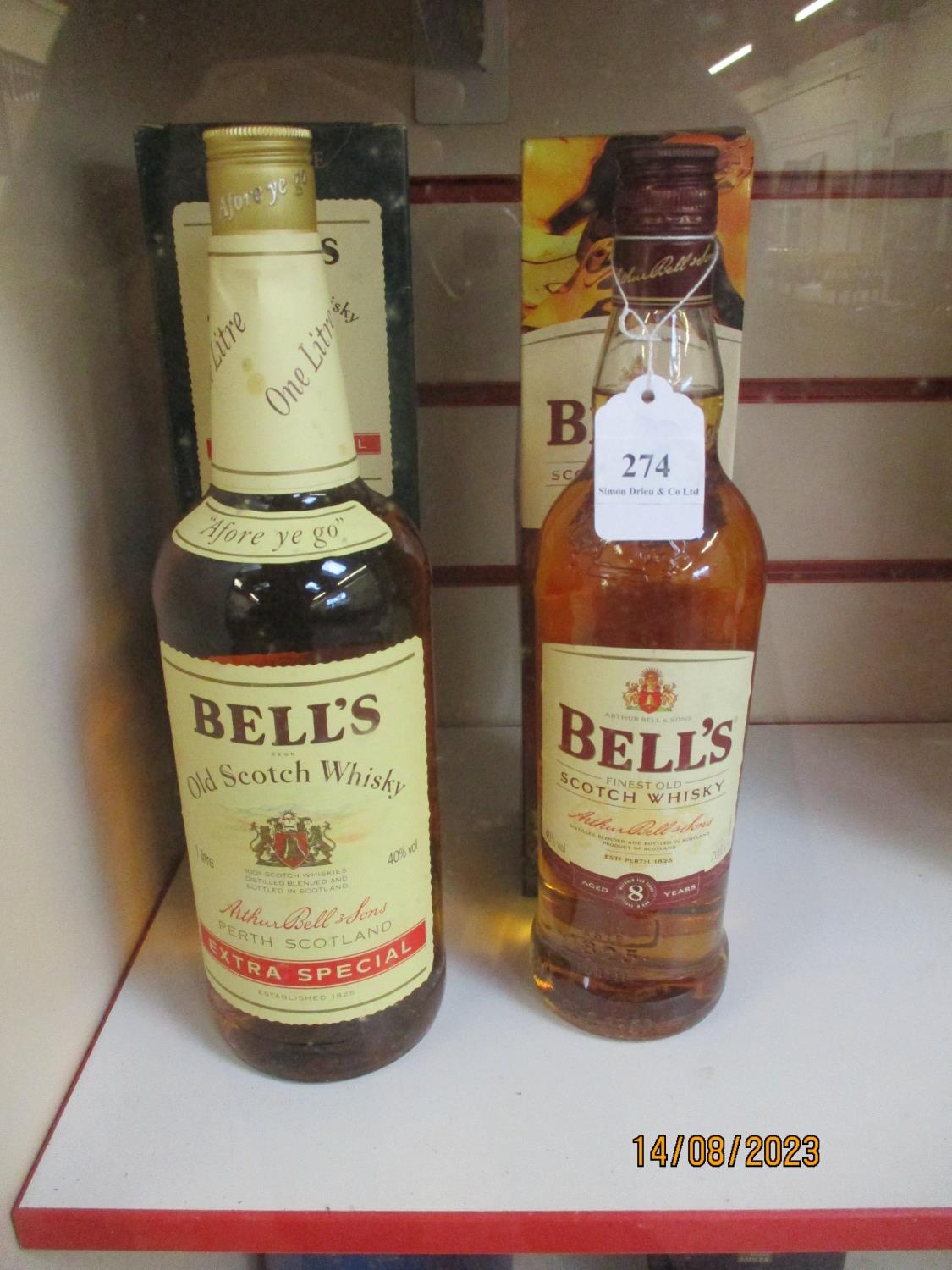 A 1L bottle of Bell's Extra Special Old Scotch Whisky together with a 70cl  bottle of Bell's Finest O