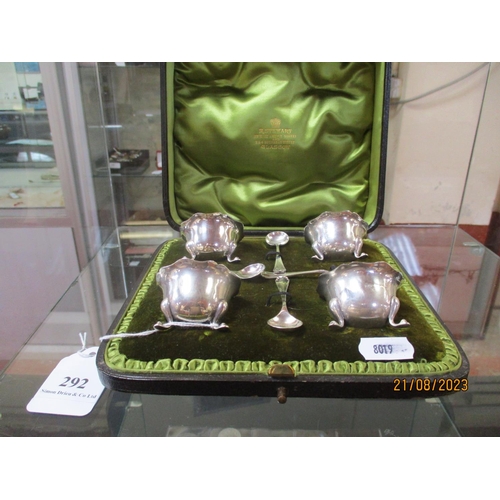 292 - A cased set of four silver salts complete with spoons retailed by Messrs. R. Stewart of Glasgow