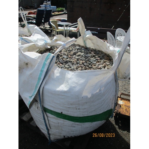 28 - A bulk bag of landscaping pebbles